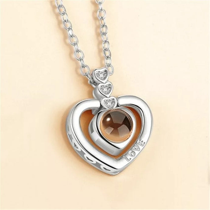 Beautiful stainless steel chain with cubic zirconia setting heart pendant that projects 